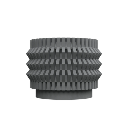 Pot décoratif gris anthracite en plastique moulé avec motifs géométriques en relief, forme cylindrique avec base légèrement.