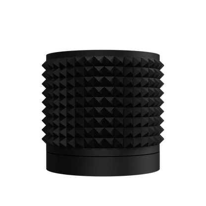 Pot décoratif noir mat avec texture en pyramides géométriques sur toute la surface, forme cylindrique large avec base lisse.