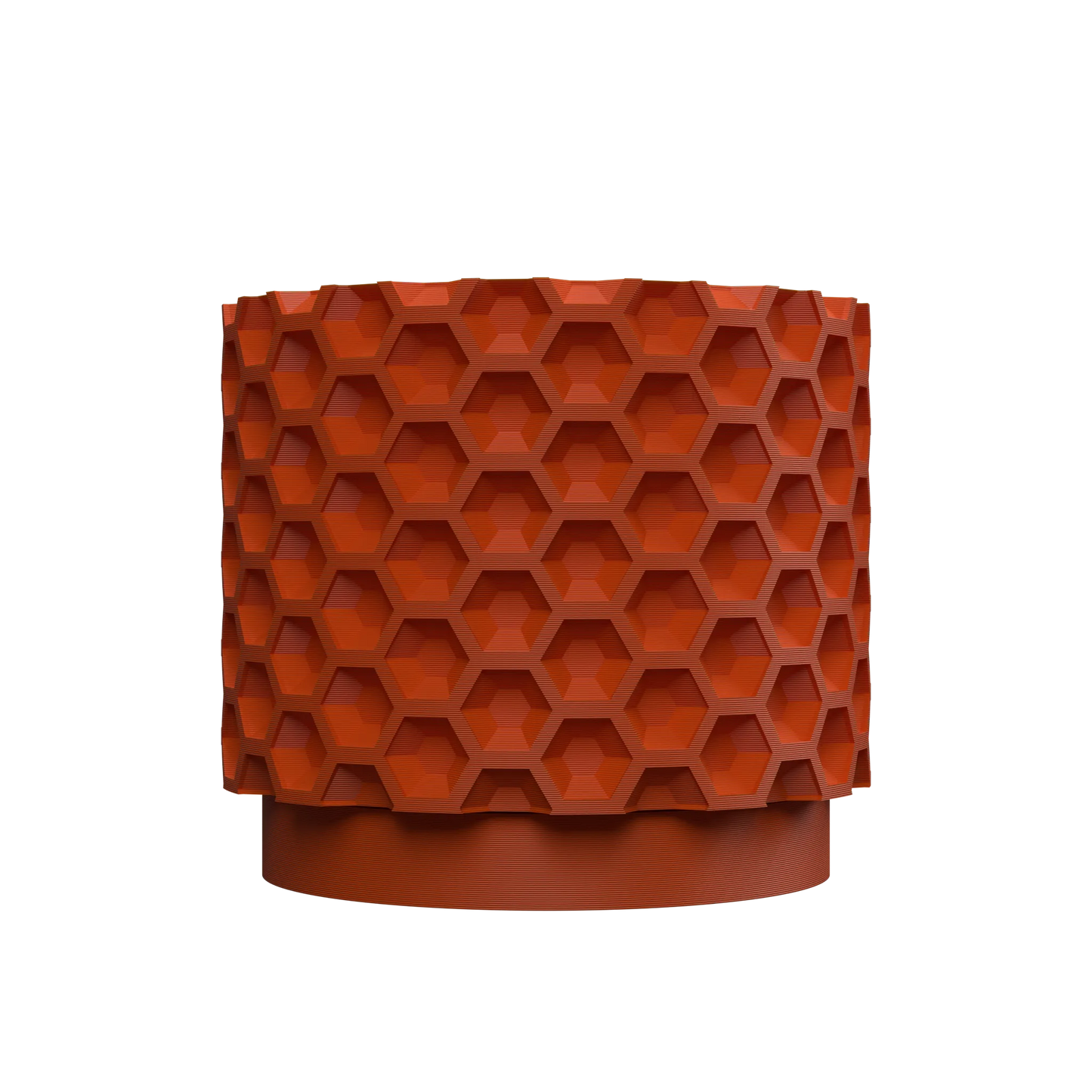 Pot décoratif rond en plastique orange avec motif en relief hexagonal évoquant une structure en nid d'abeilles, base lisse.