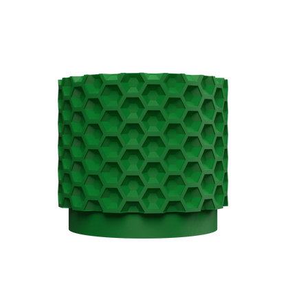 Pot décoratif vert foncé avec surface texturée en motif hexagonal en relief, forme cylindrique moderne.