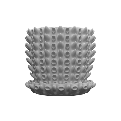 Pot décoratif blanc mat texturé avec reliefs ronds en forme de nodules sur toute la surface, de forme cylindrique avec.