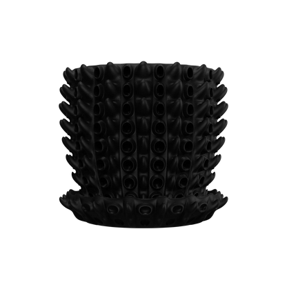 Pot décoratif noir mat en plastique moderne avec motifs en relief en forme de tubercules cylindriques, accompagné d'une.