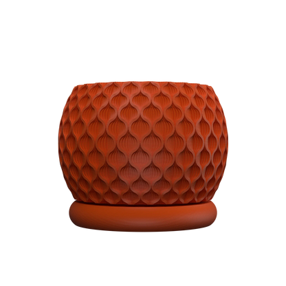 Pot décoratif rond en terre cuite orange terre battue avec texture géométrique en relief de motifs hexagonaux allongés, base