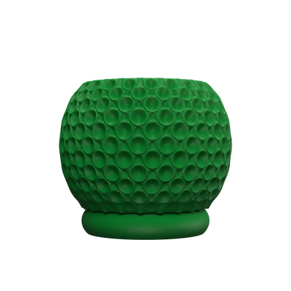 Pot décoratif vert foncé avec surface texturée en relief composée de bulles concaves, forme arrondie et base plate.