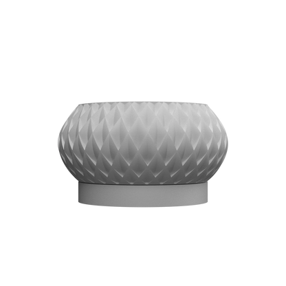 Pot décoratif gris clair en matériau moderne, forme ronde et bombée avec surface texturée en motifs géométriques.