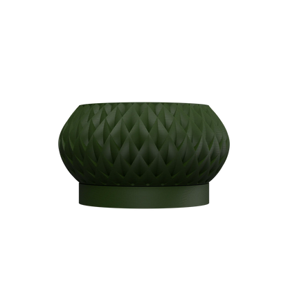Pot décoratif vert foncé avec surface texturée en relief triangulaire et base circulaire lisse.