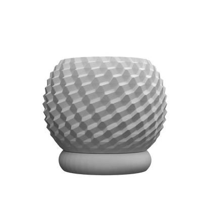 Pot décoratif gris clair mat avec texture en relief géométrique en forme de losanges, base ronde légèrement surélevée,.