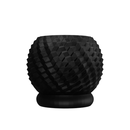 Pot décoratif noir mat avec texture géométrique en relief sur toute la surface, forme arrondie posée sur un socle circulaire