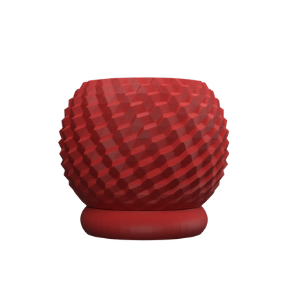 Pot décoratif rouge brique texturé avec motif géométrique en relief, base ronde lisse, design moderne et minimaliste.