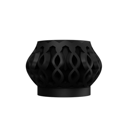 Pot décoratif noir mat en métal ajouré avec motifs entrelacés, forme ronde et évasée, style moderne.