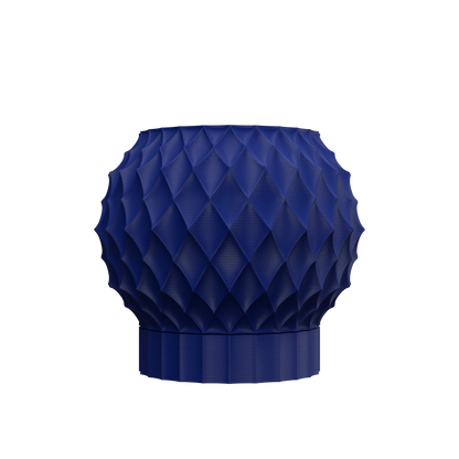 Pot décoratif bleu marine à surface texturée en motif diamant, forme arrondie avec base légèrement évasée.