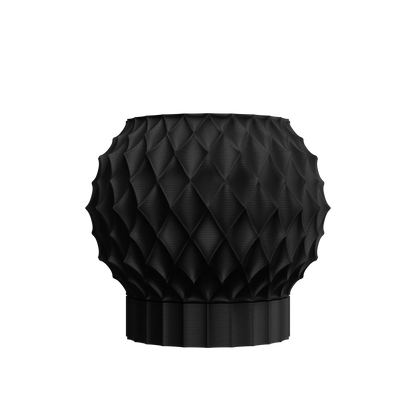 Pot décoratif noir mat avec surface texturée en motifs géométriques diamant, forme ronde et base crantée.