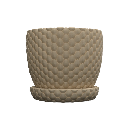 Pot décoratif beige avec texture motif écailles de dragon en relief, forme cylindrique avec soucoupe assortie.