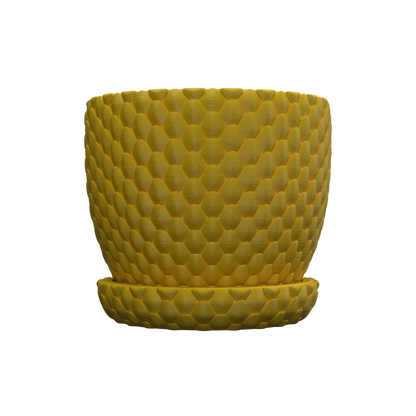 Pot décoratif jaune moutarde à motif écaille de dragon en relief, forme cylindrique avec soucoupe assortie.