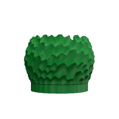 Pot décoratif vert foncé avec surface texturée en alvéoles, forme ronde et base plate.