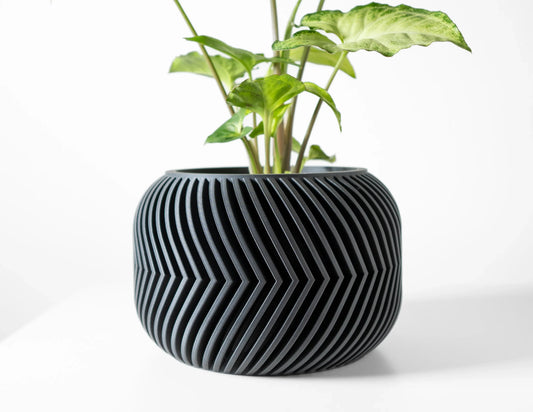 Pot décoratif anthracite en matériau durable, design contemporain avec motif géométrique en relief.