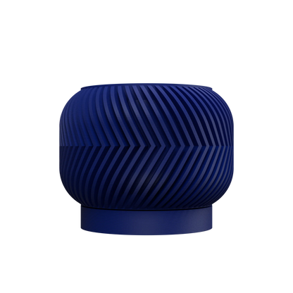 Pot décoratif moderne en matériau noir bleuté avec surface striée en spirale et base ronde plate.