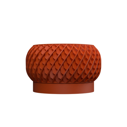 Pot décoratif rond en résine rouge orangé avec surface texturée en losanges en relief et base plate circulaire.