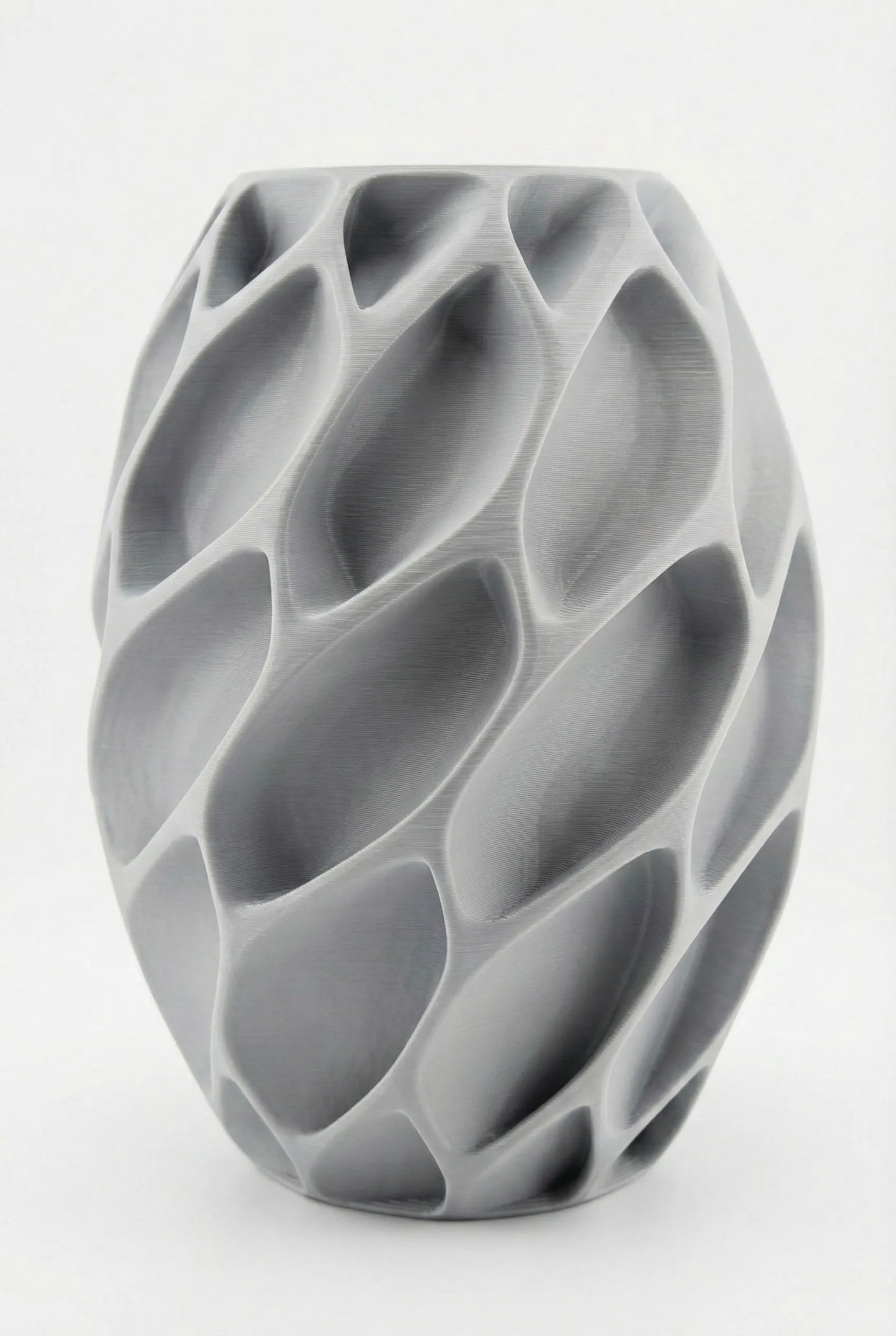Vase Exo – vase design alvéolé organique étanche - Vase design contemporain anthracite en céramique avec surface organique et géométrique alvéolée, forme sculpturale unique. - Anthracite