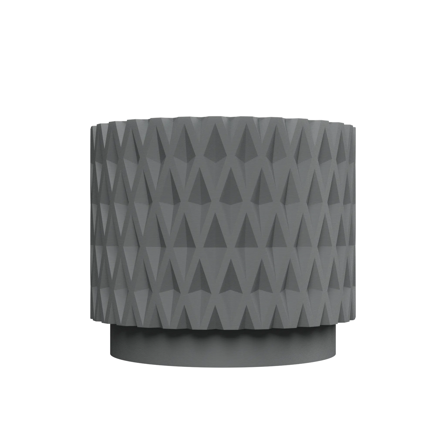 Pot décoratif gris en matériau moderne avec surface texturée en triangles en relief, forme cylindrique large.