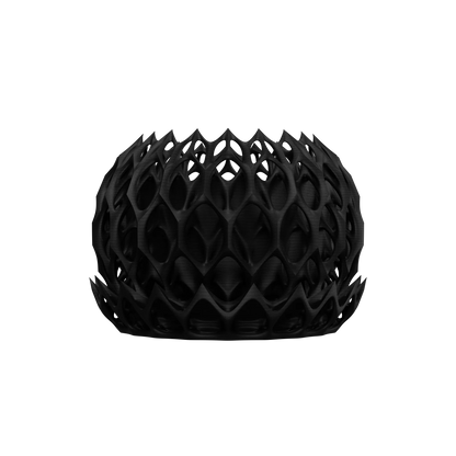Pot décoratif noir mat à structure géométrique en forme de nid d’abeille, aspect moderne et sculptural.