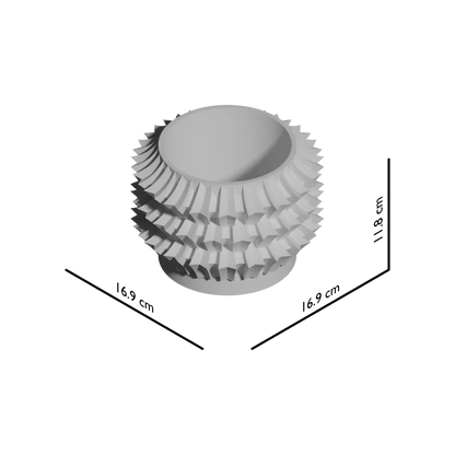 Pot décoratif blanc à surface texturée en motifs géométriques en relief, forme ronde et moderne.