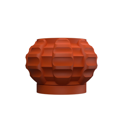 Pot décoratif moderne en jute teinté terracotta avec reliefs géométriques arrondis et base circulaire robuste.