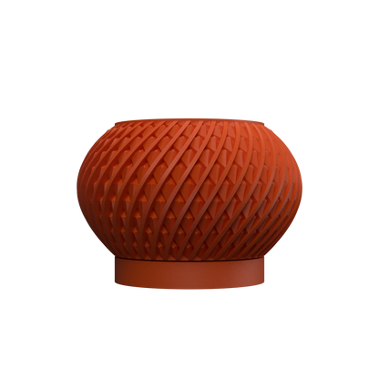 Pot décoratif Kio en terre cuite aux motifs géométriques tressés, forme ronde et base plate.