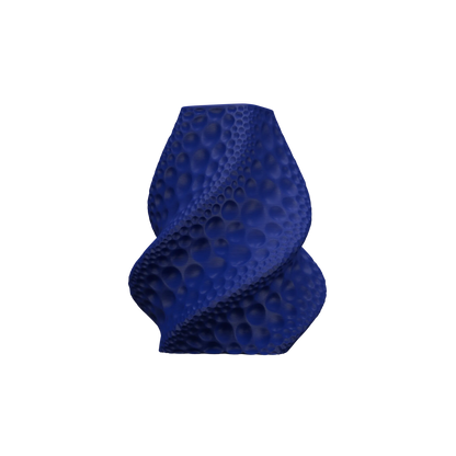 Vase bleu foncé aux formes torsadées avec une texture de bulles en relief couvrant toute la surface, design moderne et.