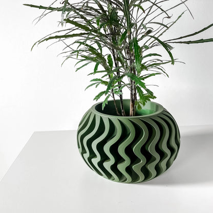 Pot décoratif rond anthracite et vert avec motif ondulé, design contemporain durable en matériaux résistants.