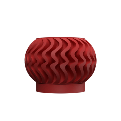 Pot décoratif rouge vif en matériau durable avec design contemporain ondulé et forme ronde compacte.