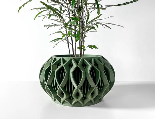 Pot décoratif en plastique vert forêt durable avec design contemporain et motifs géométriques creux.