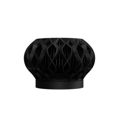 Pot décoratif Octa noir en matériau durable au design contemporain ajouré et forme arrondie unique.