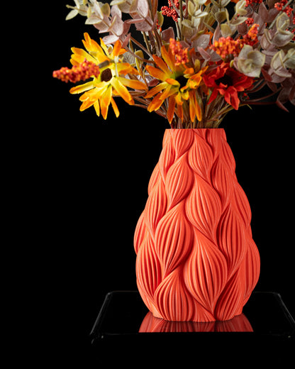 Vase contemporain orange 160mm avec surface ondulée texturée, design durable et étanche, moderne et élégant.