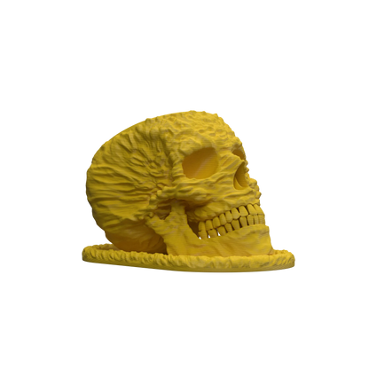 Pot décoratif jaune vif en forme de crâne texturé, style moderne, détails de dents et cavités oculaires creuses.