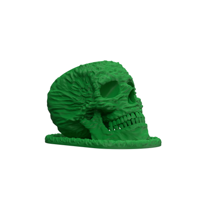 Pot décoratif vert en forme de crâne humain avec détails texturés en relief sur toute la surface, style moderne et audacieux.